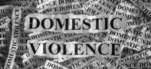Domestic,Violence.,Torn,Pieces,Of,Paper,With,The,Words,Domestic